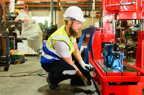 Image result for An Engineer Fixing Machine