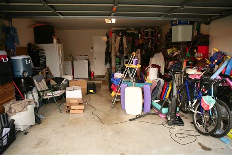 https://www.thesmartergarage.com/wp-content/uploads/2022/07/garagegclutter.jpeg