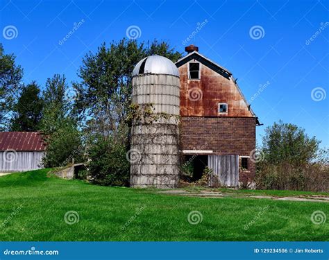 A Ceramic Brick Barn and a Cement Silo Editorial Photo - Image of ...