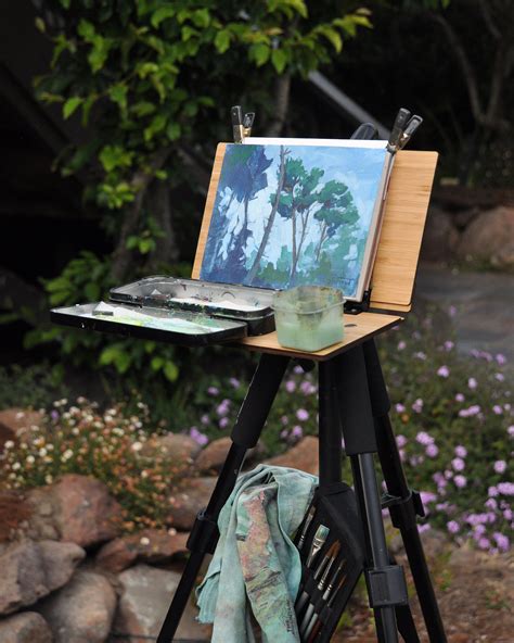 Artist Painting On Easel