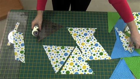 How to Use a Quarter Square Triangle Ruler for Quilting 的图像结果