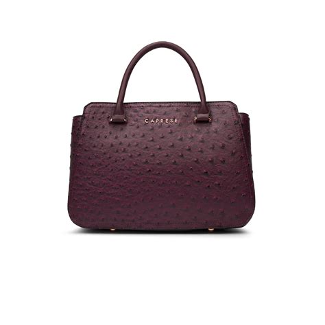 Buy Caprese Britney Medium Cherry Lacquer Satchel Bag @ 2149 | Caprese Bags