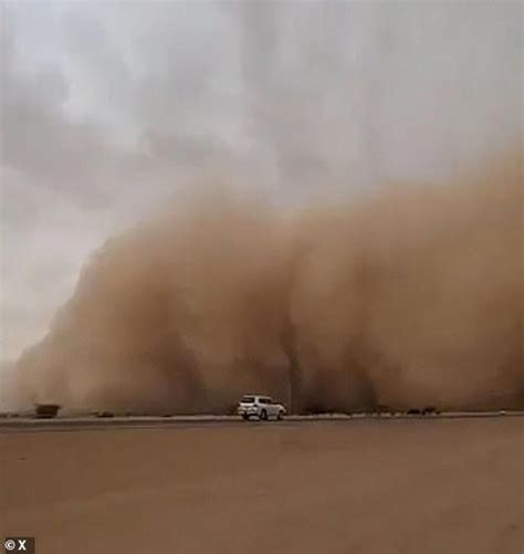 Moment gigantic 'wall of dust' sand storm engulfs Saudi town sparking ...