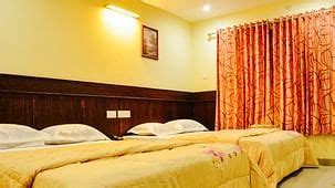 The Signature Inn Hotel Bangalore | Hotel near Majestic Railway Station
