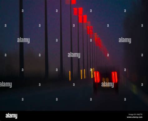 Driving by night Stock Photo - Alamy