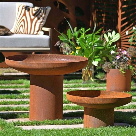 Modern bird bath that also works as plant or fire bowl