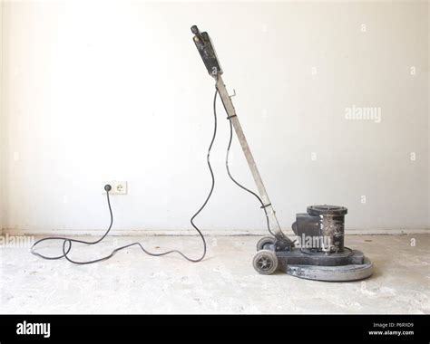 Construction business concept : Concrete surface sanding machine ...