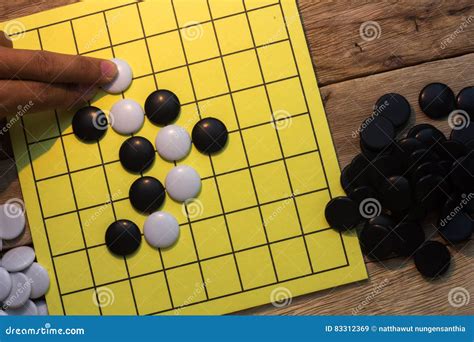 Igo Chinese Board Game with Black and White Stone. Stock Image - Image ...