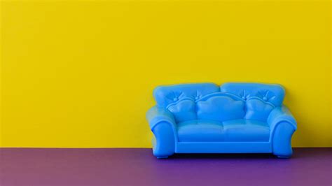 Beautiful Blue Sofa On The Purple Floor At The Yellow Wall A Sample Of ...