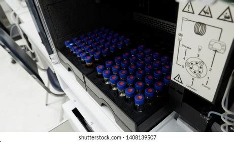 Image result for HPLC Machine W Robotic Arm