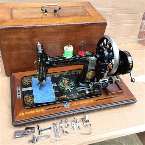 Image result for Hand-Cranked Sewing Machine
