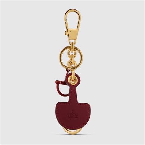 Half-Horsebit shaped keychain in Rosso Ancora red leather | GUCCI® US