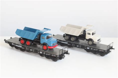 Trix H0 - 24403 - Güterwagen - Set mit 2 zwaarlastwagens - Catawiki