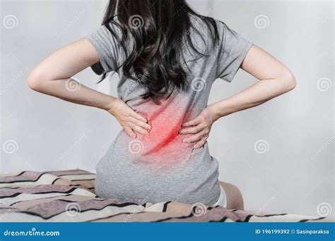Backache and Lower Back Pain Concept. Young Woman Suffering from Back Pain, on Bed after Waking ...