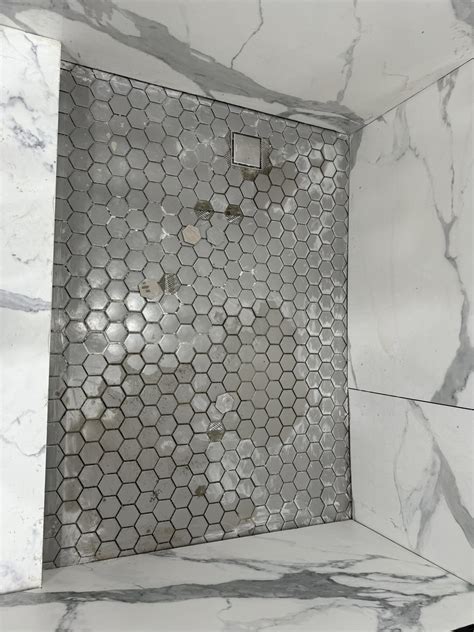Shower floor tiles popping out : r/Tile