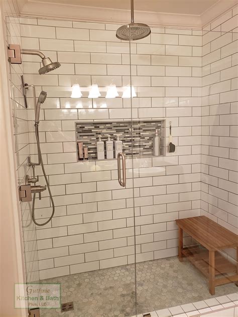 Relaxing Shower Design: Stylish Subway Tile with Storage Niche & Wooden ...