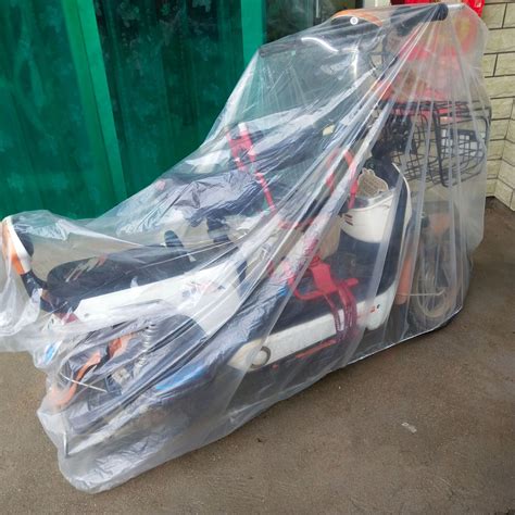 一次性电动车罩 防雨防尘摩托车车罩 一次性塑料加厚电车防雨罩-阿里巴巴
