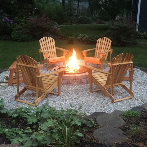 DIY Backyard Fire Pit with Adirondack Chairs and Handmade Benches
