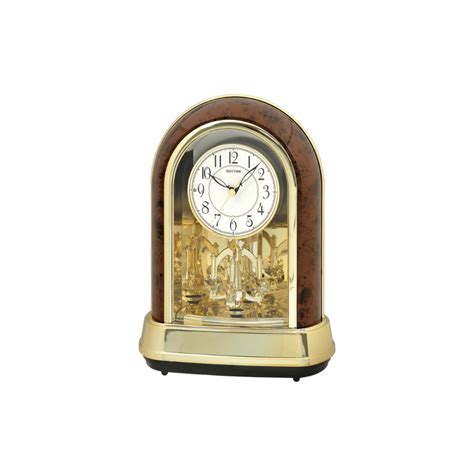 Rhythm Woodgrain Rotating Pendulum Table Clock – cuckooclocks-in
