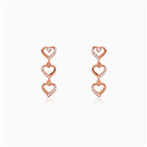 Rose Gold Triple Heart Dangler Earrings – GIVA