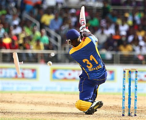 Muttiah Muralitharan celebrates a wicket | ESPNcricinfo.com