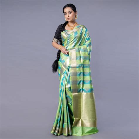 Kanjivaram saree in teal and green color with golden zari border boota ...