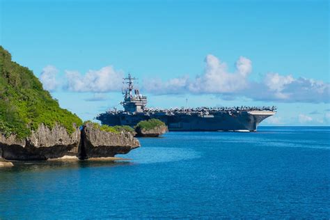 USS Ronald Reagan (CVN 76) arrives at Naval Base Guam for a Safe Haven ...