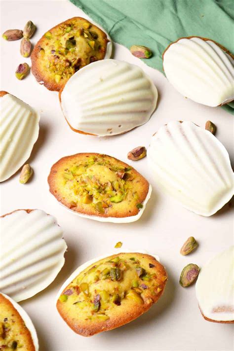 Pistachio Madeleines with White Chocolate Shell - Jaja Bakes