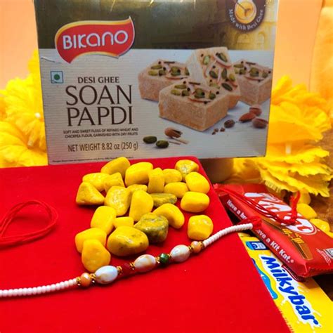 Fascinating Rakhi with Soan Papdi N Duo Chocolates - EGPSPKKCB5DUSRKH21
