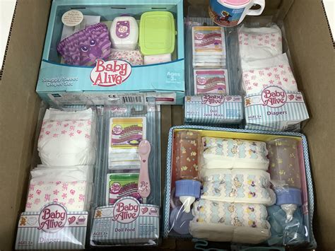 Lot - Vintage Baby Alive Diapers, Hasbro Clothing Sets