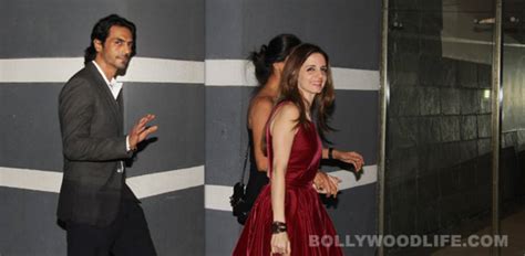 What was Sussanne Roshan doing with Arjun Rampal after filing for ...