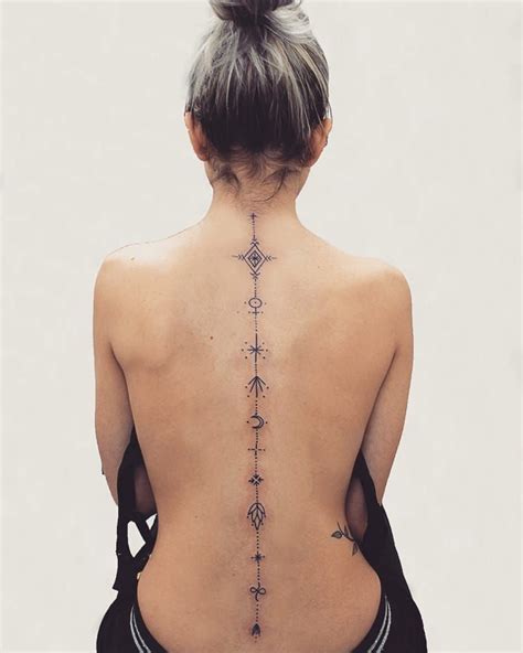 777 Spine Tattoo Female