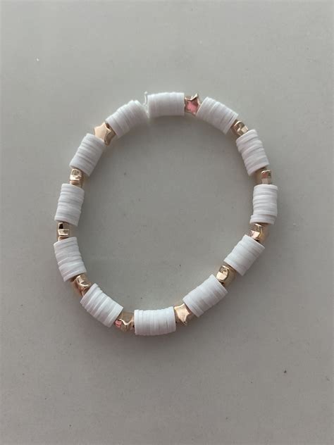 White Bracelet | Clay bead necklace, Beads bracelet design, Beaded ...