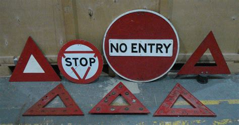 Bonhams Cars : Assorted road warning signs and triangles,