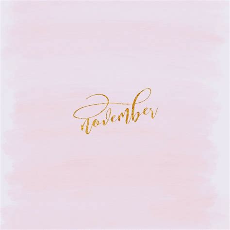 November in Cursive Writing on Pink Watercolor Background