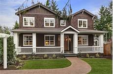 Brown House Exterior by Brown House White Window And Railing Trim But Eaves Are Brown House Exterior