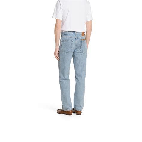 Pantalone in denim délavé con inserto GG in celeste | GUCCI® Italia