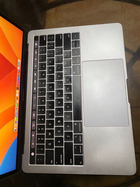 Image result for MacBook Pro 13-Inch with Touch Bar Processor