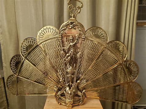 Brass peacock fireplace screen | Collectors Weekly