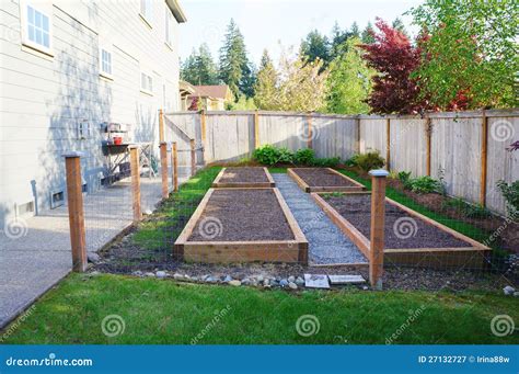 Small Vegetable Garden in the Fenced Back Yard. Stock Image - Image of ...