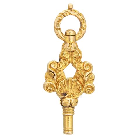 Antique Victorian Watch Key Fob 18k Yellow Gold Chased Shell Winder ...