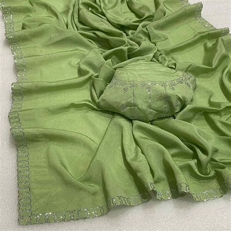 Green Embellished Silk Blend Saree Featuring Fine Swarovski Stone Deta