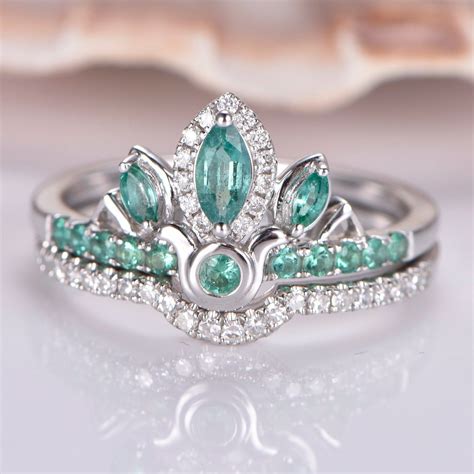 emerald engagement ring with wedding band