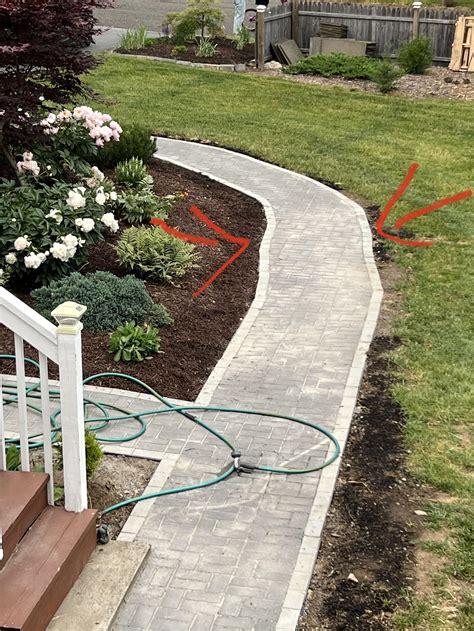 I just finished laying a paver walkway and… : r/landscaping