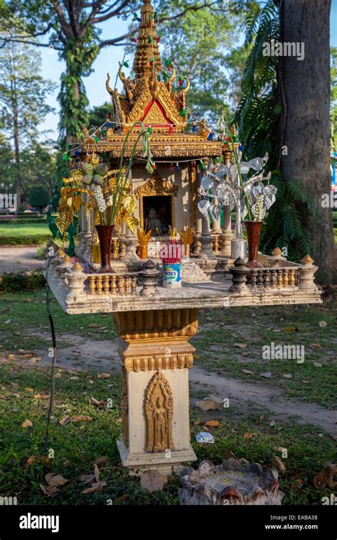 Cambodia, Siem Reap. Sidewalk Shrine to Spirits for Good and Evil ...