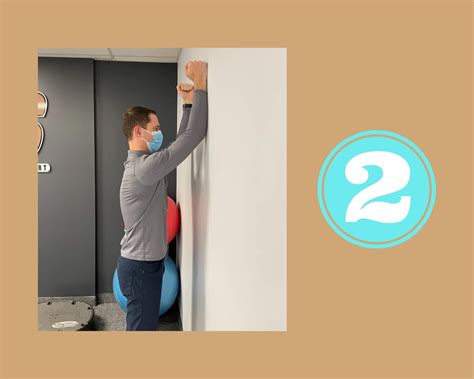 Shoulder Exercise- Wall Slide - SOS Physiotherapy