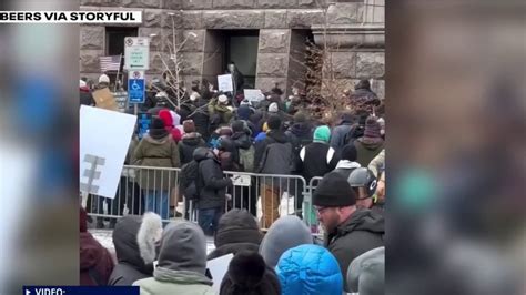 Far-right influencer Jake Lang arrested for damaging 'Prosecute ICE ...