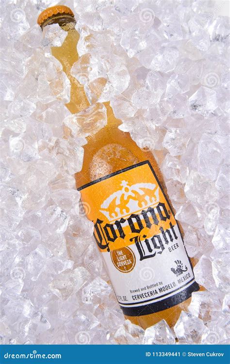 Corona Light Beer Bottle in Ice Editorial Photo - Image of drink ...