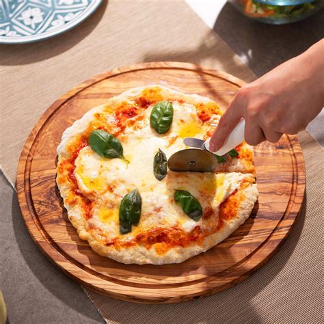 Buy Olive Wood Pizza Serving Plate Online at Lowest Price in Ubuy India ...