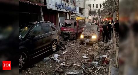 Hezbollah military commander's body found in debris of Beirut building ...
